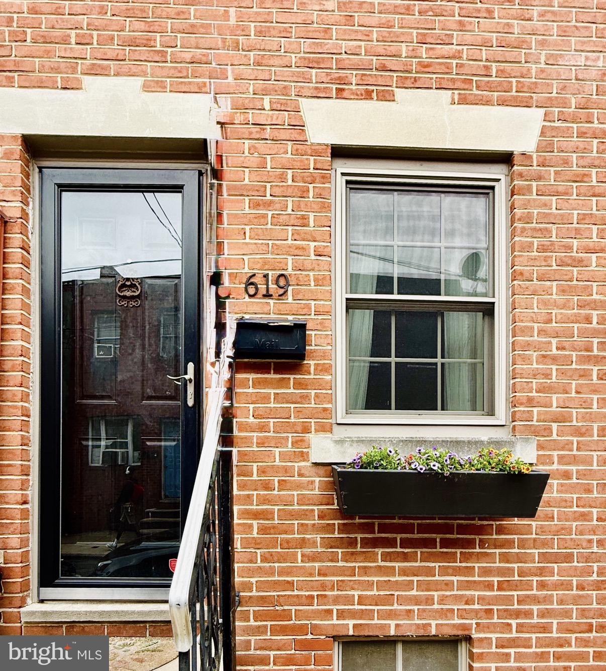 619 Sears Street Philadelphia, PA 19147 - Photo 20 of 23 a front view of a house with a window