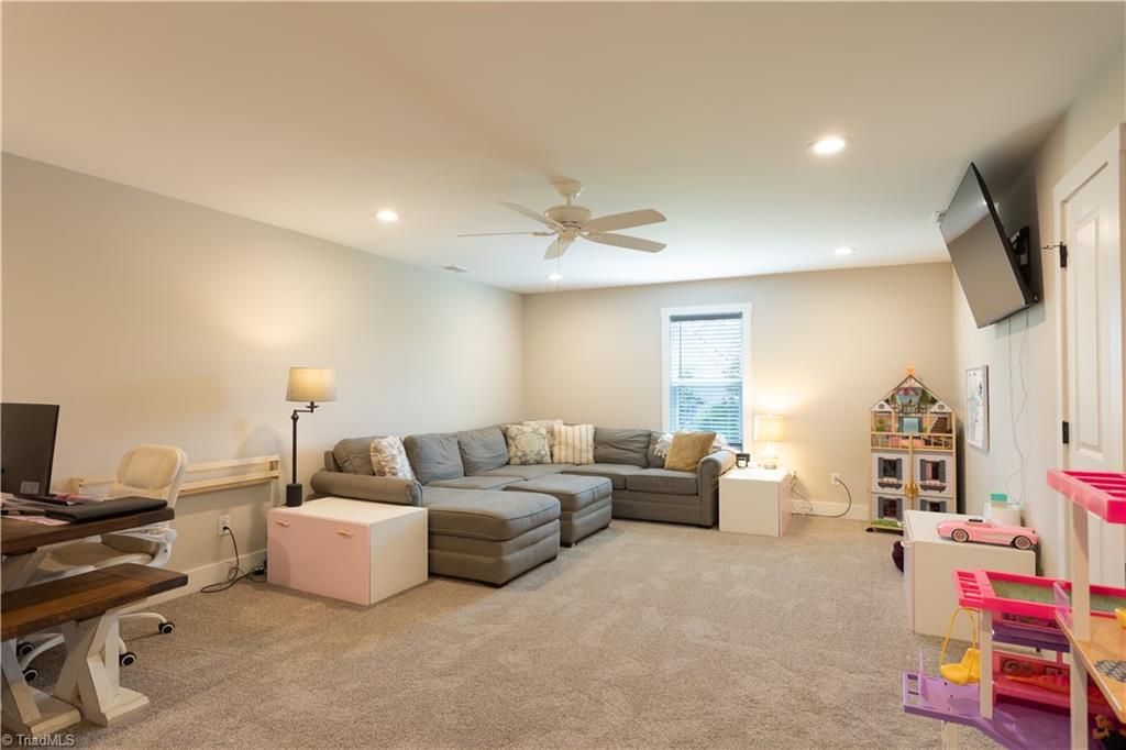 393 Scout Road Lexington, NC 27292 - Photo 42 of 47 The bonus room is listed as the 4th bedroom and it is HUGE!!! Currently used as an additional living space, play room, AND craft room. Your family will want to live up here! Need a fourth bedroom, everyone will be fighting over this one! It would be a wonderful bunk room.