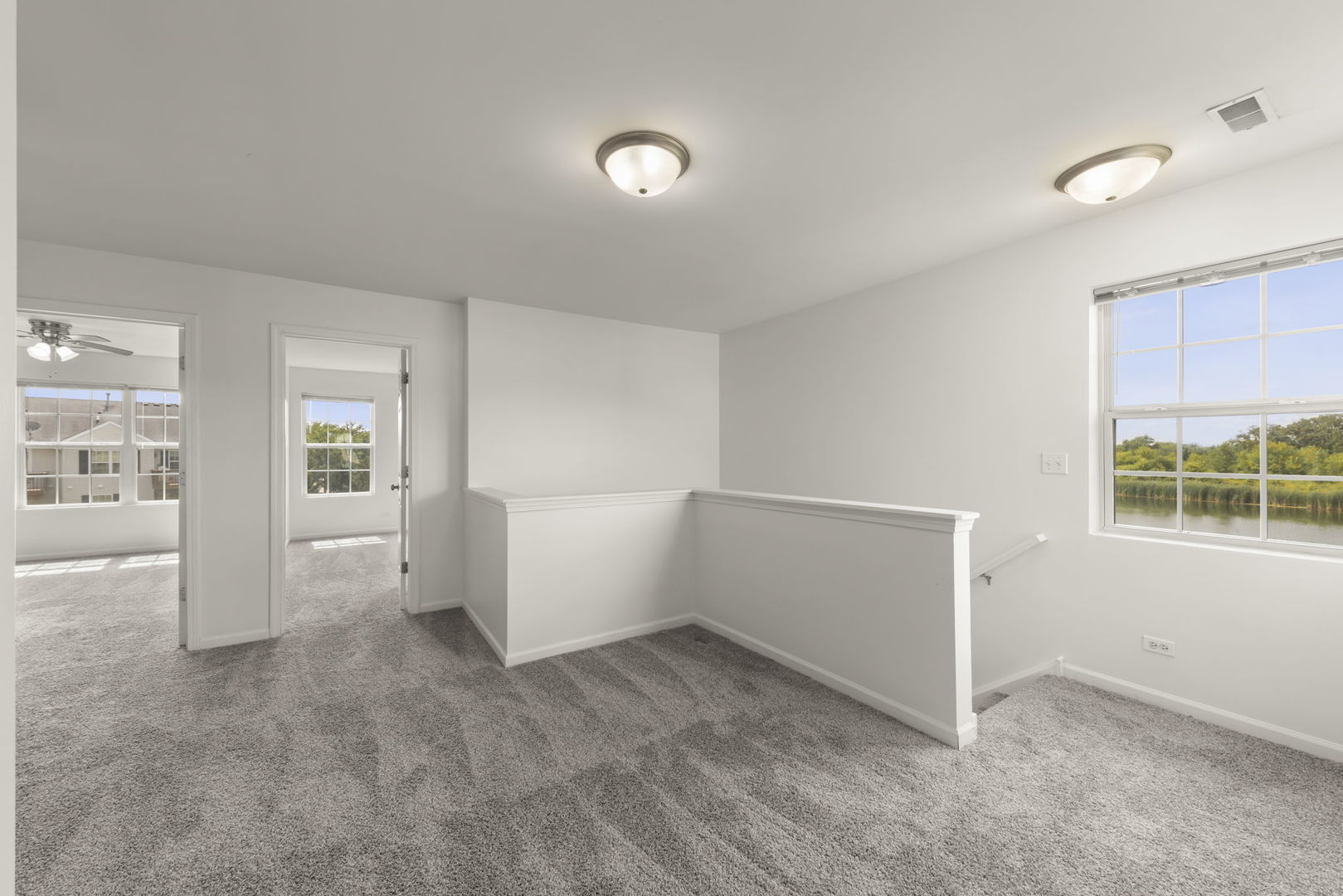 1034 Turin Drive Hampshire, IL 60140 - Photo 11 of 23 an empty room with windows