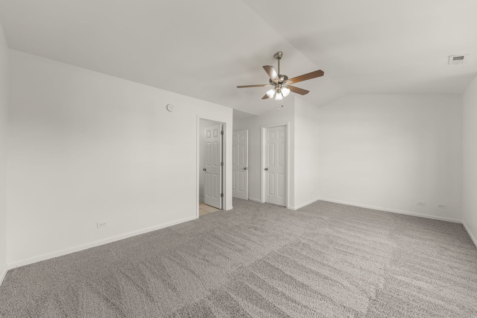1034 Turin Drive Hampshire, IL 60140 - Photo 13 of 23 a view of an empty room with a ceiling fan