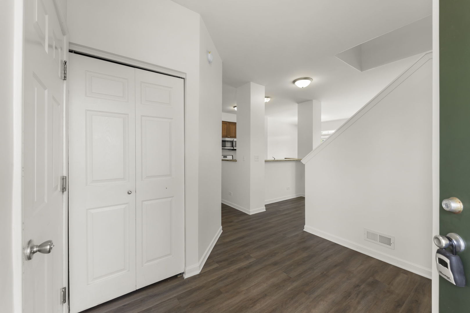 1034 Turin Drive Hampshire, IL 60140 - Photo 18 of 23 a view of a hallway with wooden floor