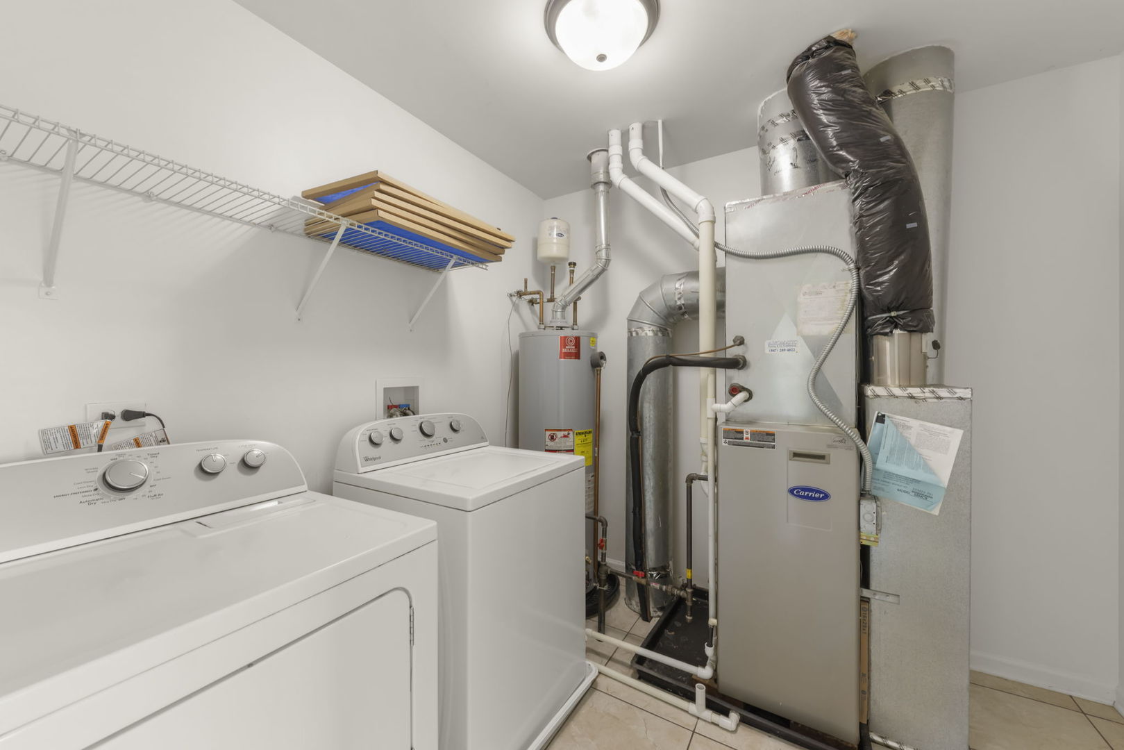1034 Turin Drive Hampshire, IL 60140 - Photo 19 of 23 a utility room with dryer and washer