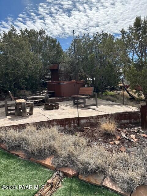 2373 Roberts Road Ash Fork, AZ 86320 - Photo 25 of 41 a view of a yard with a bench