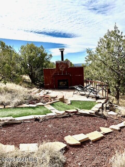 2373 Roberts Road Ash Fork, AZ 86320 - Photo 27 of 41 a view of a garden with an outdoor space
