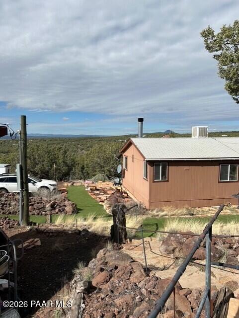 2373 Roberts Road Ash Fork, AZ 86320 - Photo 30 of 41 a view of a terrace with a table and chairs