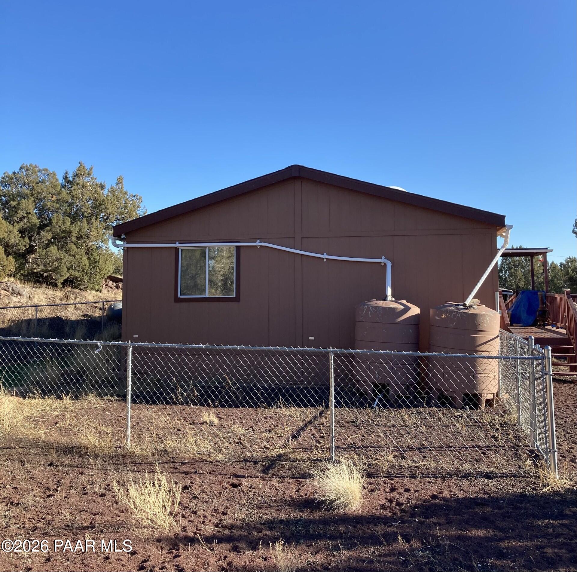 2373 Roberts Road Ash Fork, AZ 86320 - Photo 39 of 41 a backyard of a house