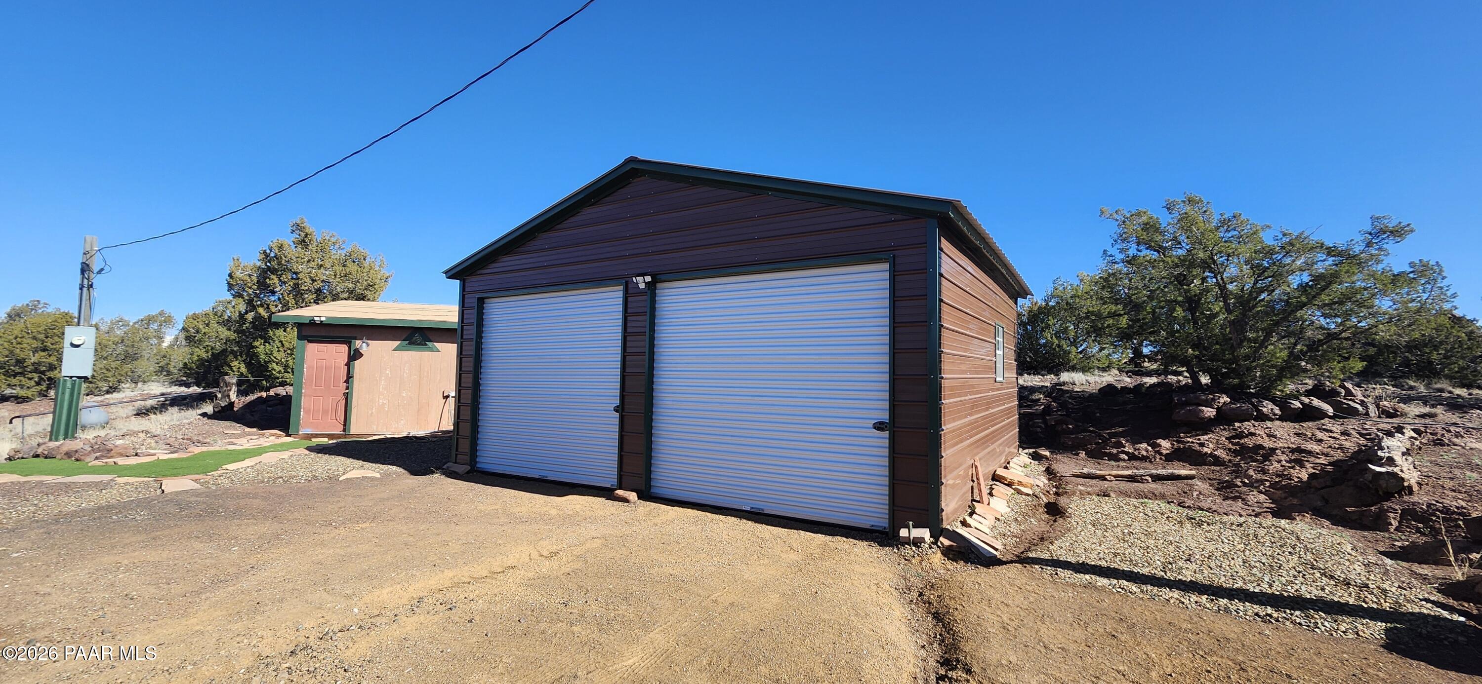 2373 Roberts Road Ash Fork, AZ 86320 - Photo 41 of 41 a view of a house with a yard