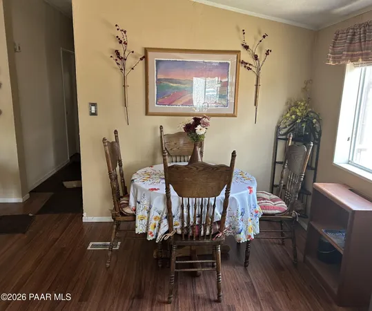 a room with furniture and window