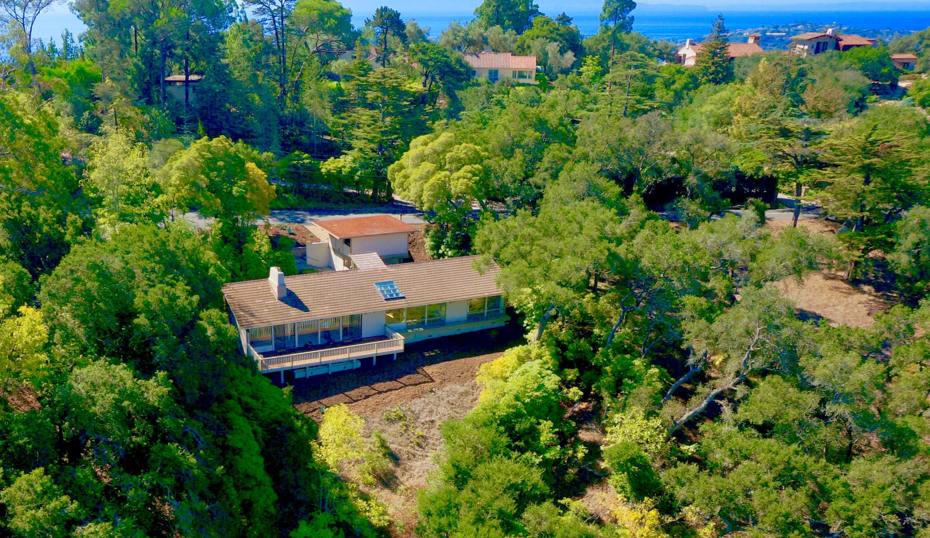 1202 Las Alturas Road Santa Barbara, CA 93103 - Photo 1 of 17 an aerial view of a house with a yard swimming pool and outdoor seating
