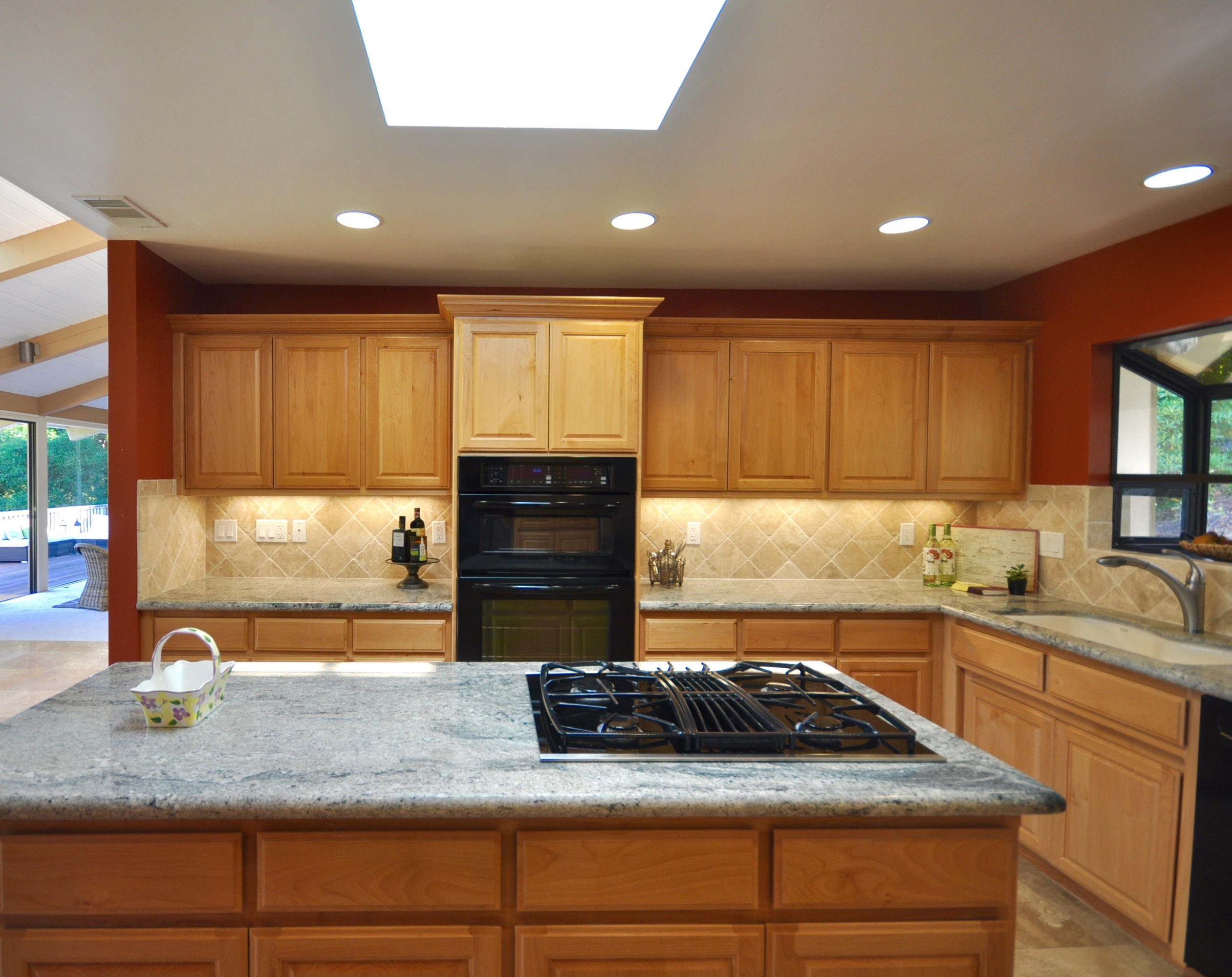1202 Las Alturas Road Santa Barbara, CA 93103 - Photo 7 of 17 a kitchen with stainless steel appliances granite countertop sink stove and cabinets