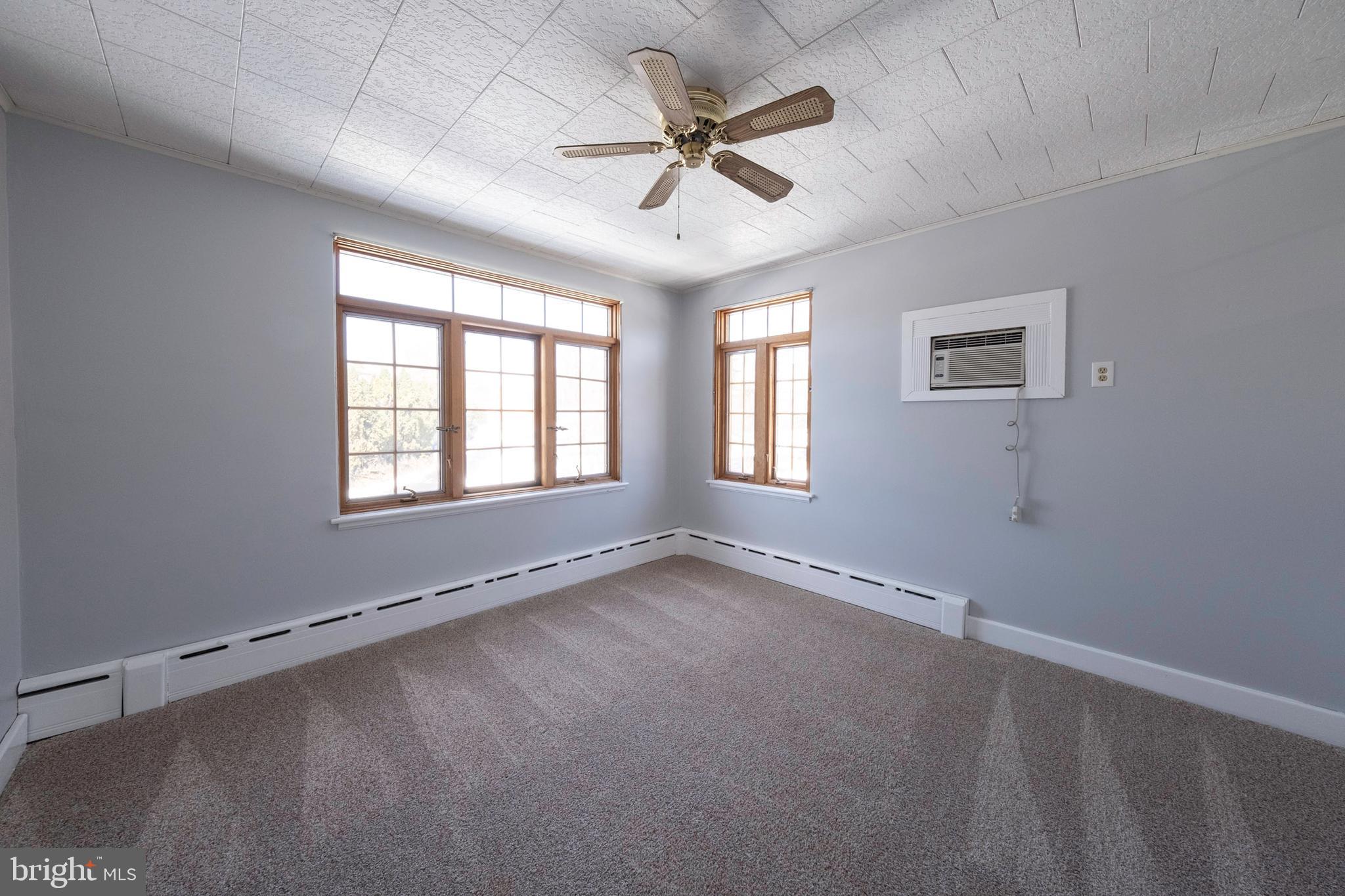 333 Sunset Road Reading, PA 19611 - Photo 14 of 17 a view of an empty room with a window