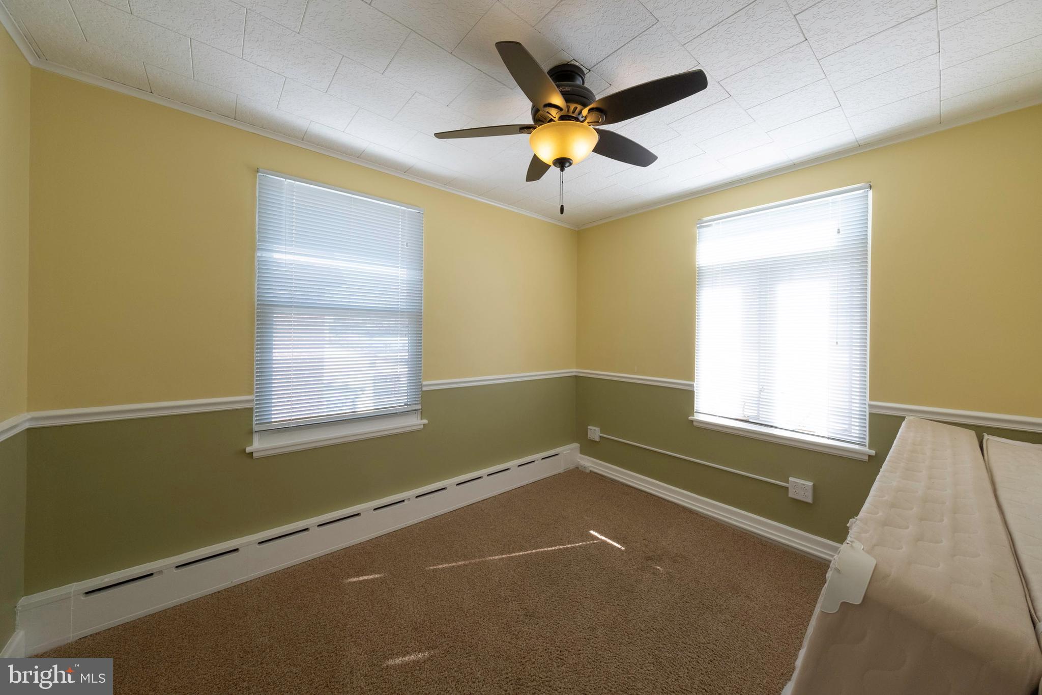 333 Sunset Road Reading, PA 19611 - Photo 15 of 17 a view of a livingroom with a ceiling fan and a window