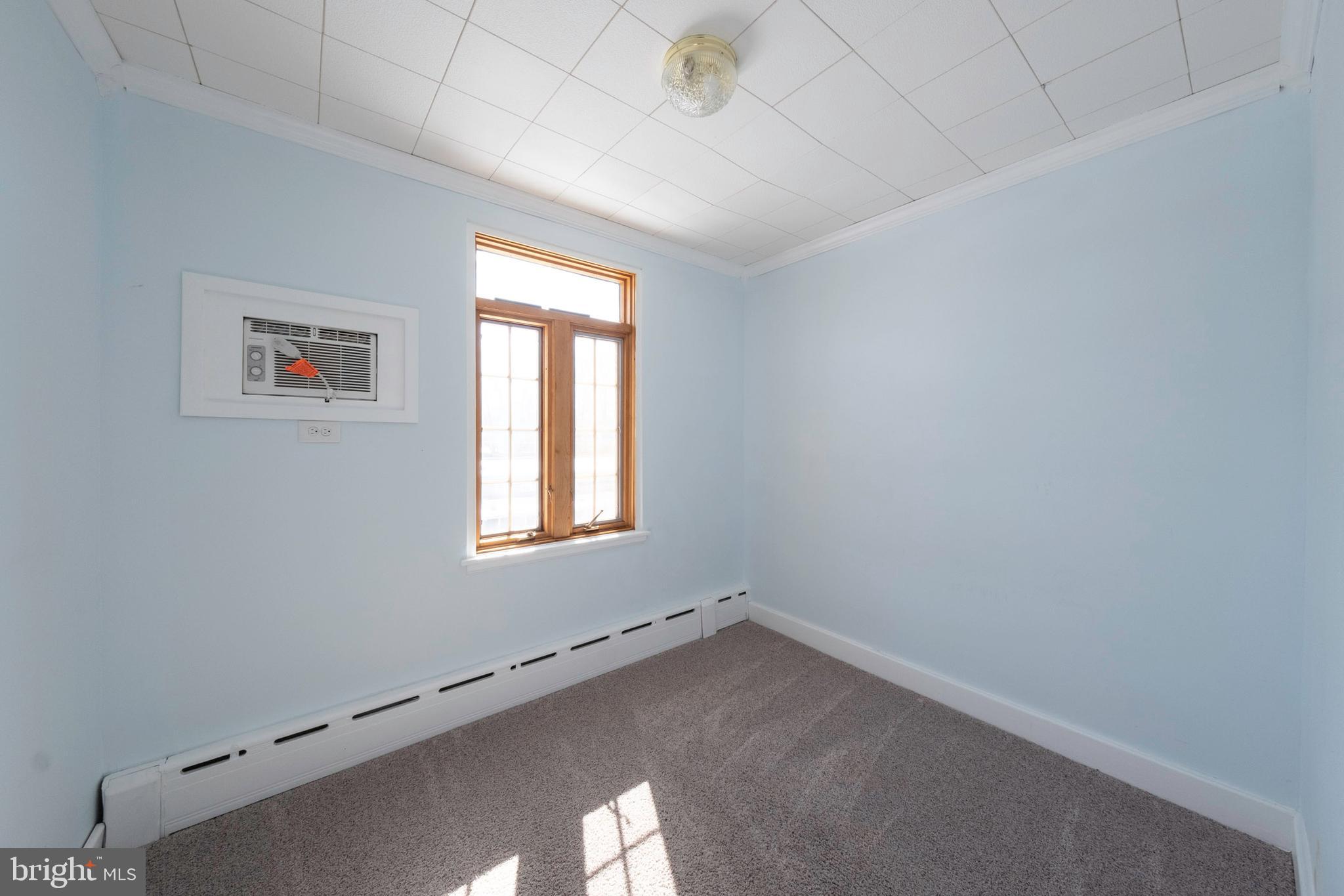 333 Sunset Road Reading, PA 19611 - Photo 16 of 17 an empty room with a window