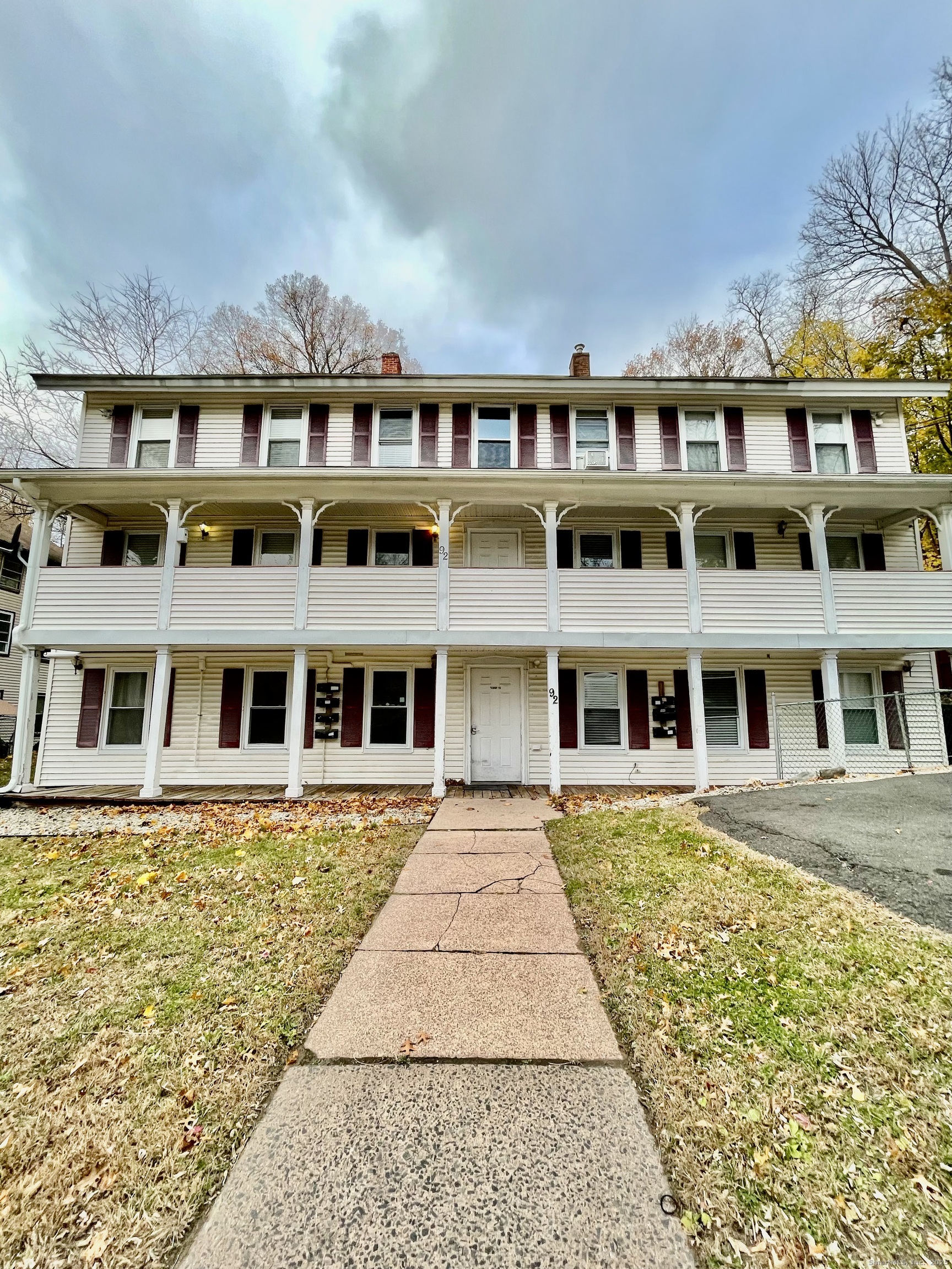 92 West Main Street, Unit 4 Vernon, CT 06066 - Photo 1 of 10 a front view of a multi story building