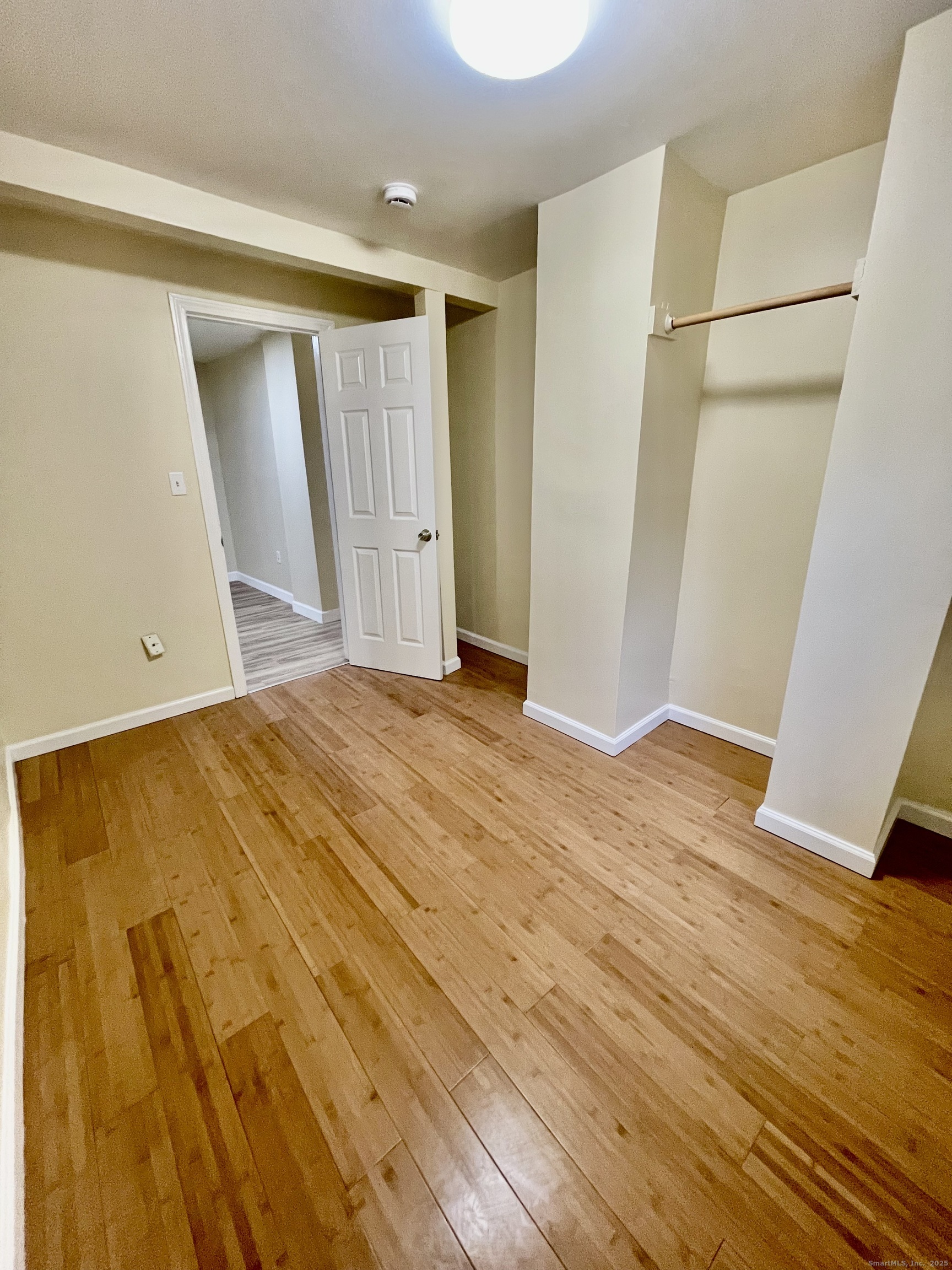 92 West Main Street, Unit 4 Vernon, CT 06066 - Photo 7 of 10 a view of empty room with wooden floor