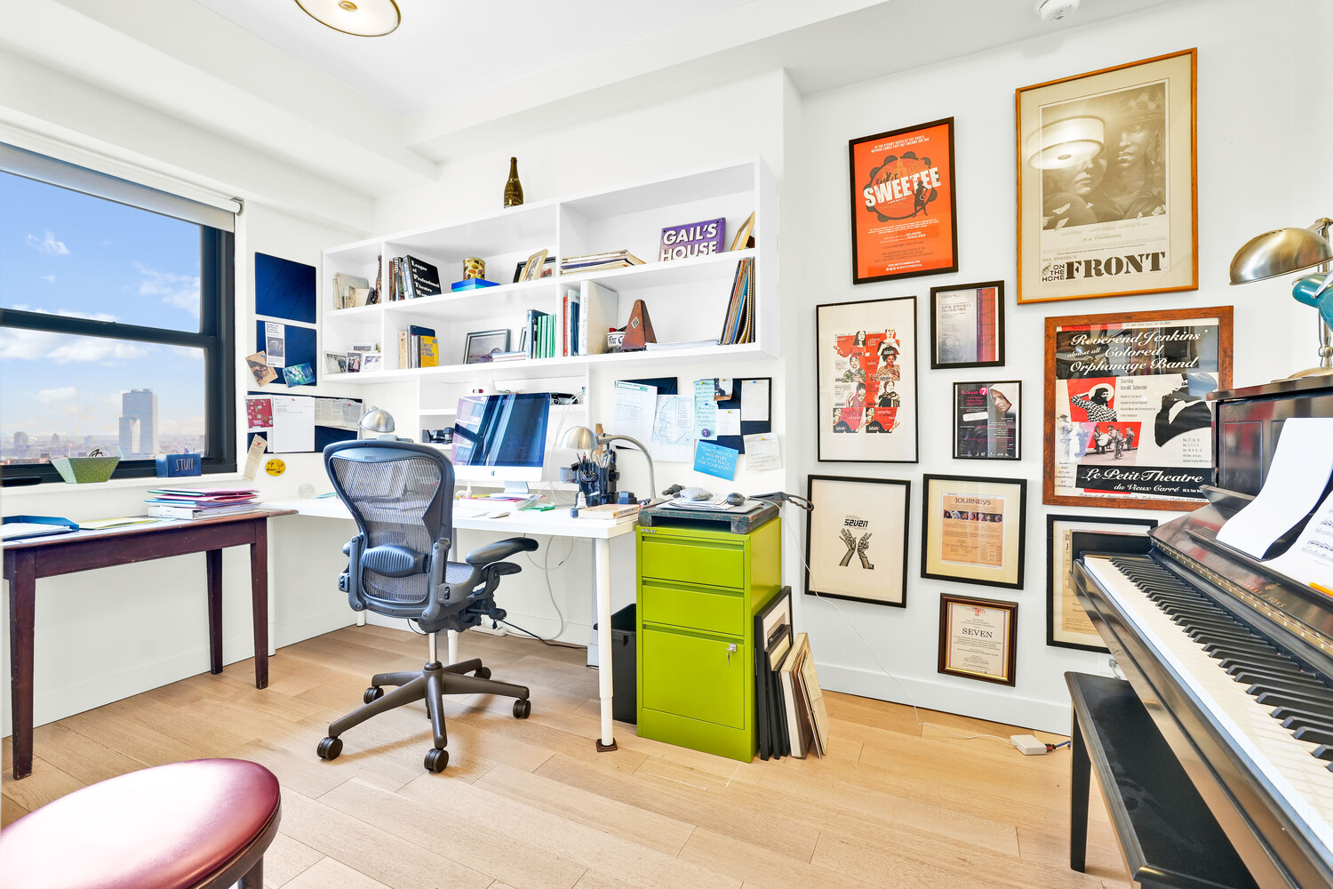 268 East Broadway, Unit A1706 Manhattan, NY 10002 - Photo 17 of 39 a view of a workspace with furniture and a workspace