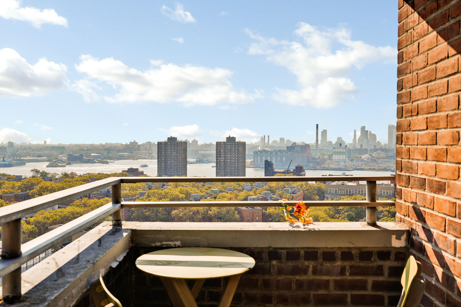 268 East Broadway, Unit A1706 Manhattan, NY 10002 - Photo 22 of 39 a view of swimming pool with outdoor seating and city view