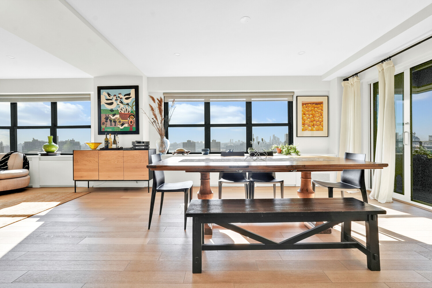 268 East Broadway, Unit A1706 Manhattan, NY 10002 - Photo 33 of 39 a dining room with furniture and window