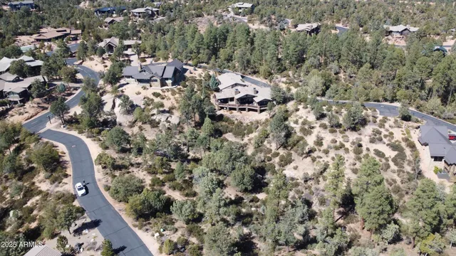 an aerial view of residential house with outdoor space