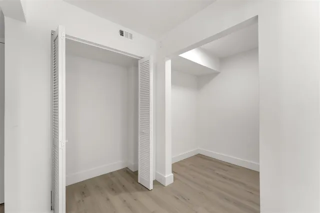 a view of small space with wooden floor