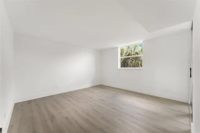 an empty room with a window