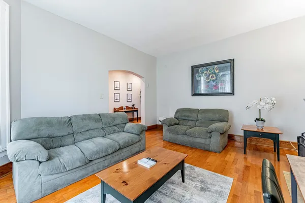 a living room with furniture and a couch
