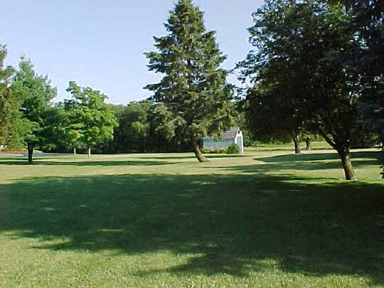 5509 North Woodburn Road Byron, IL 61010 - Photo 6 of 8 a garden view with a playing ground