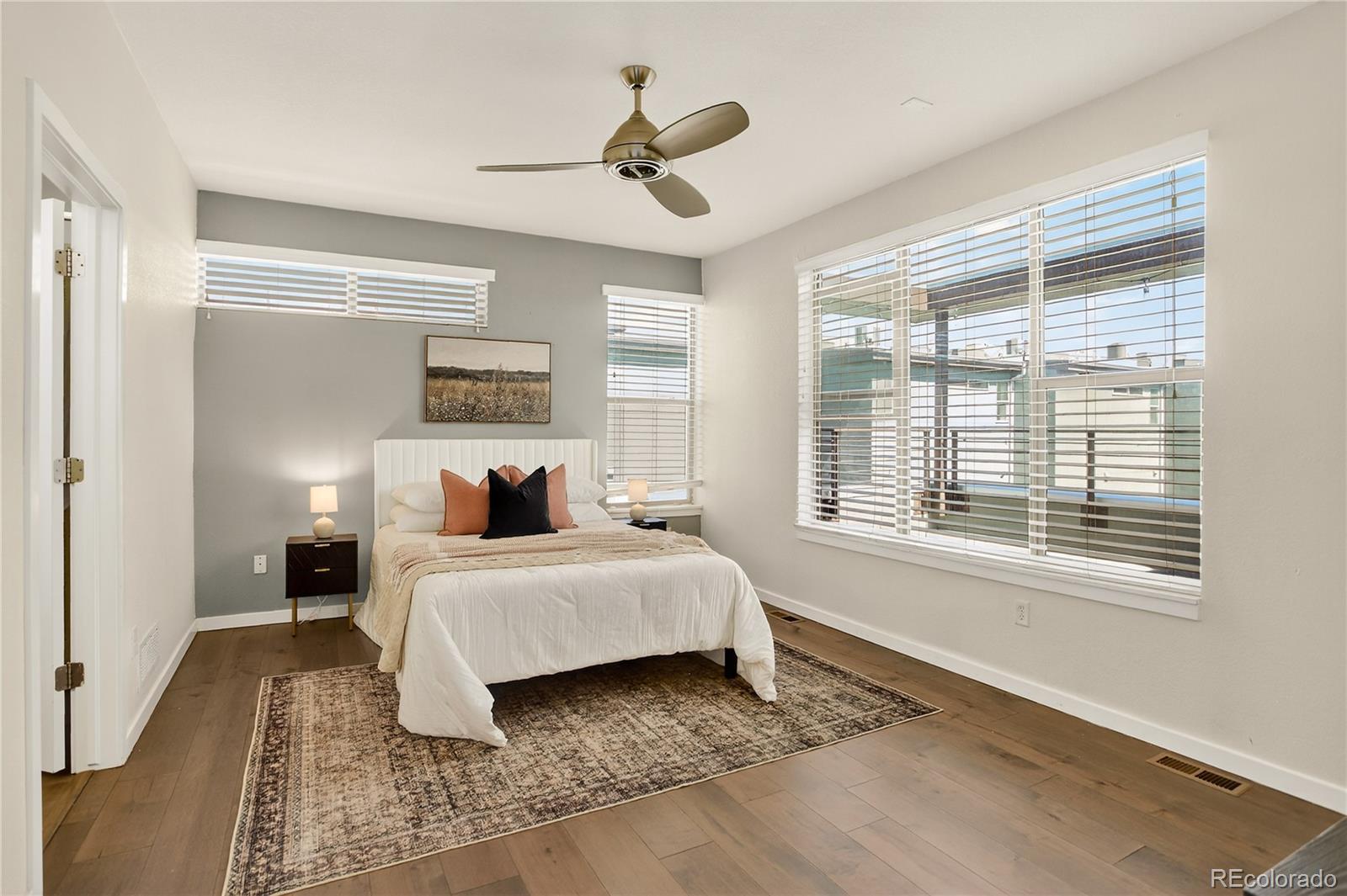 2130 Clay Street Denver, CO 80211 - Photo 13 of 22 a bedroom with a large bed and a window