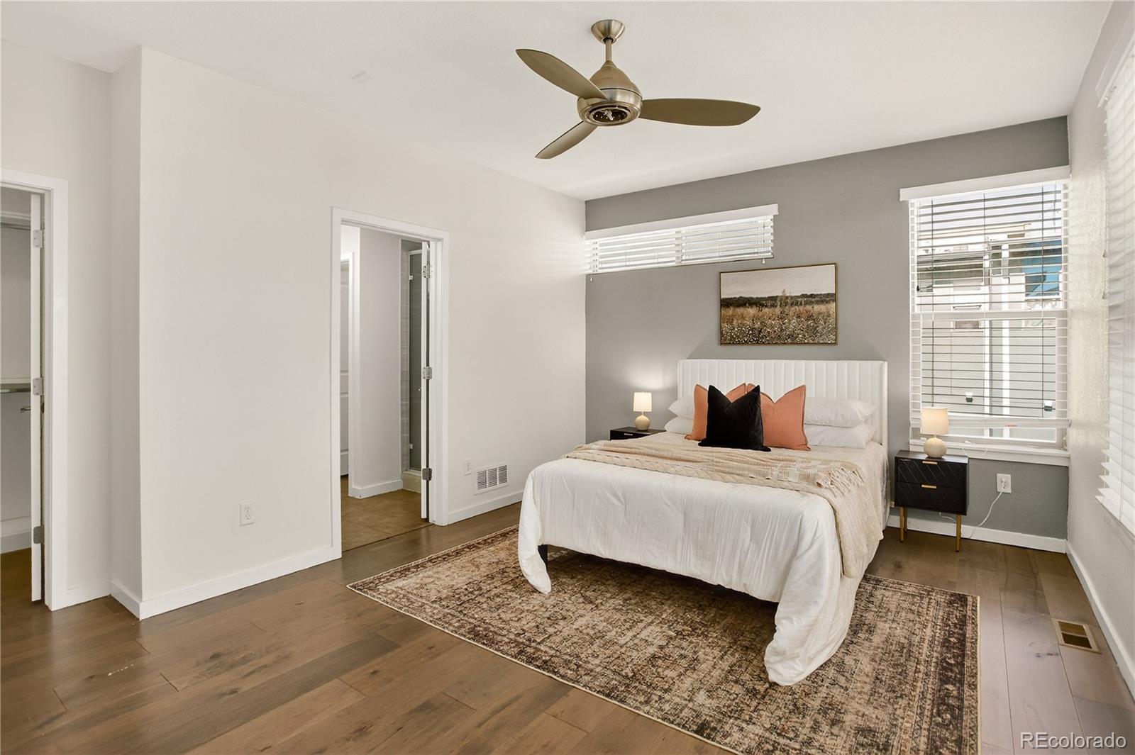 2130 Clay Street Denver, CO 80211 - Photo 14 of 22 a bedroom with a bed and a window