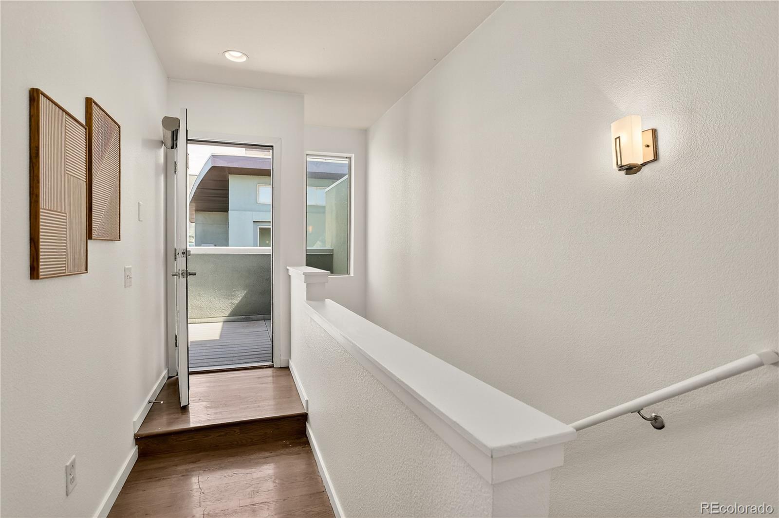 2130 Clay Street Denver, CO 80211 - Photo 18 of 22 a view of hallway with walk in closet and window