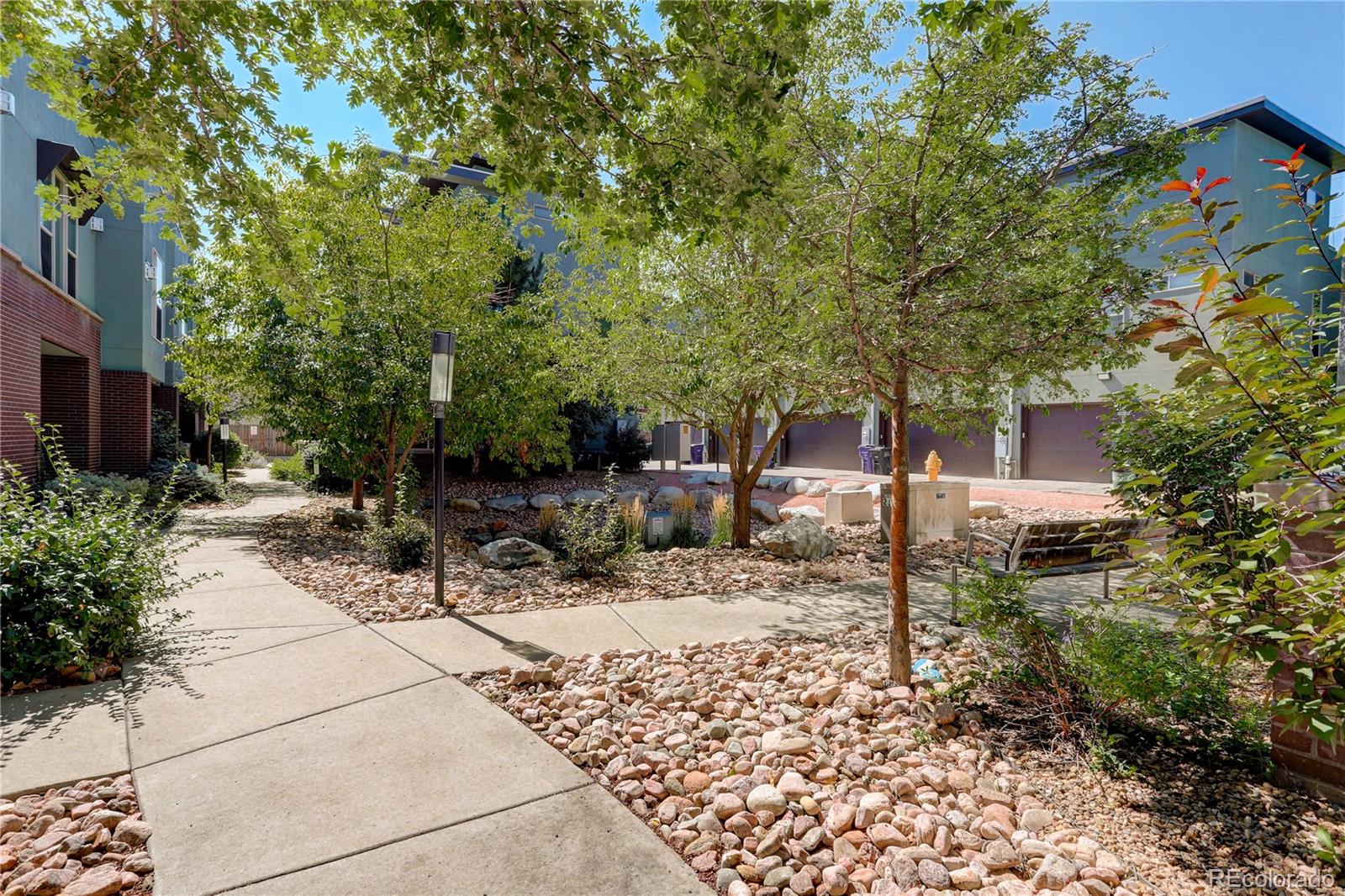 2130 Clay Street Denver, CO 80211 - Photo 22 of 22 a pathway of a house with a yard