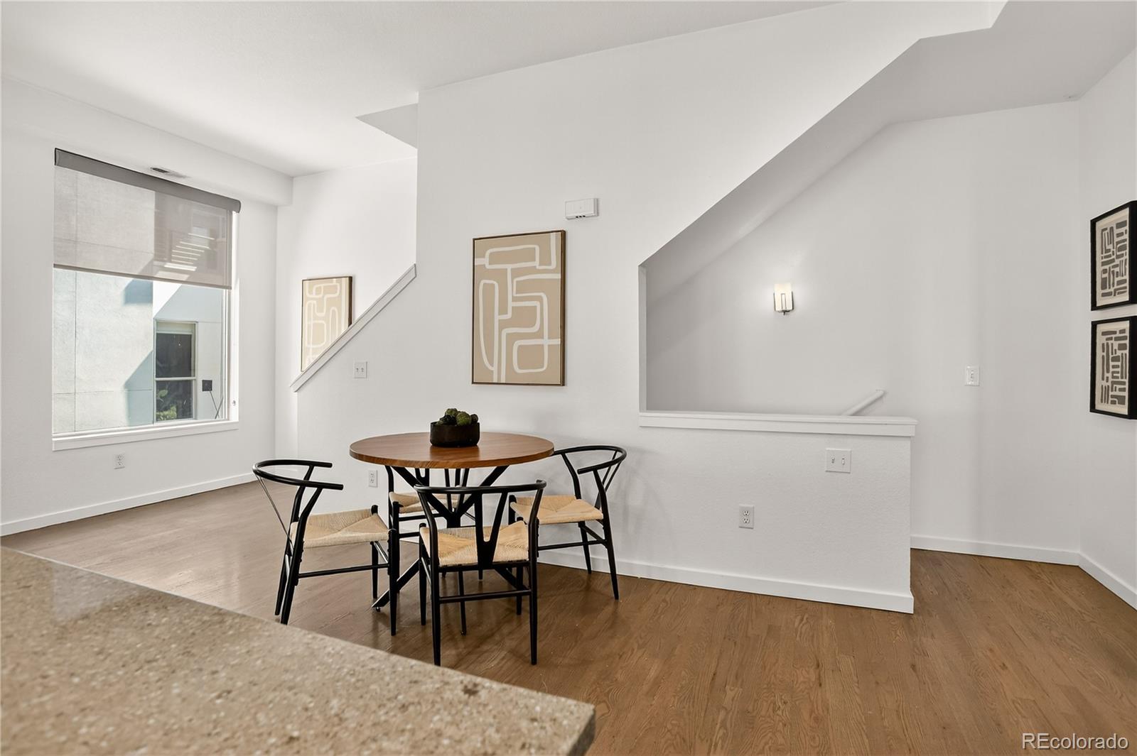 2130 Clay Street Denver, CO 80211 - Photo 9 of 22 a view of a dining room with furniture and wooden floor