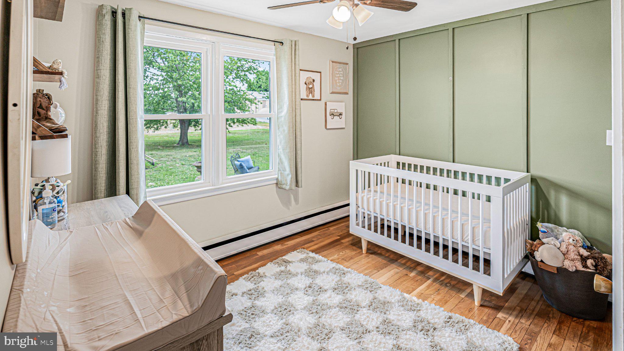 16 Garrison Road Elmer, NJ 08318 - Photo 10 of 17 Serene nursery with green accents.