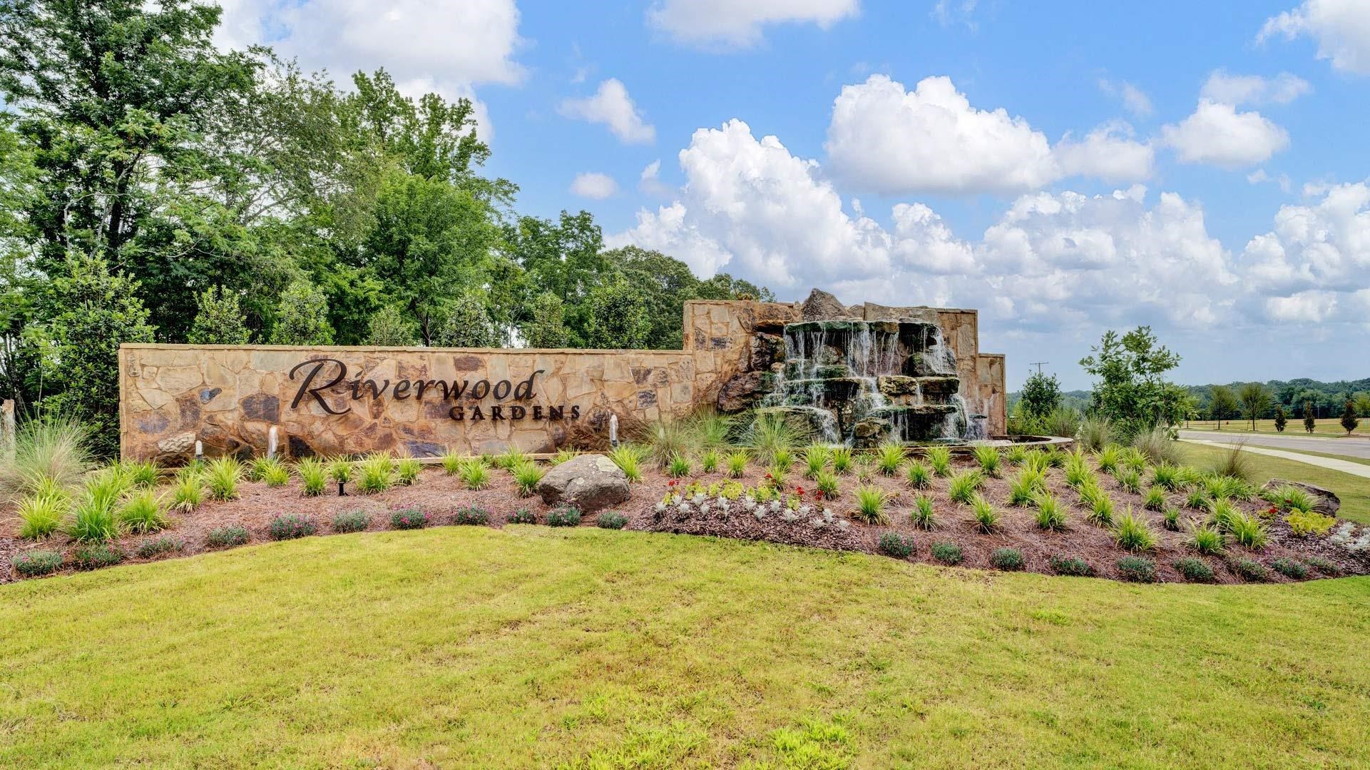 980 Mewborn Farm Road Oakland, TN 38060 - Photo 30 of 34 Stone-faced entry monument with Riverwood Gardens signage and integrated multi-tiered waterfall feature