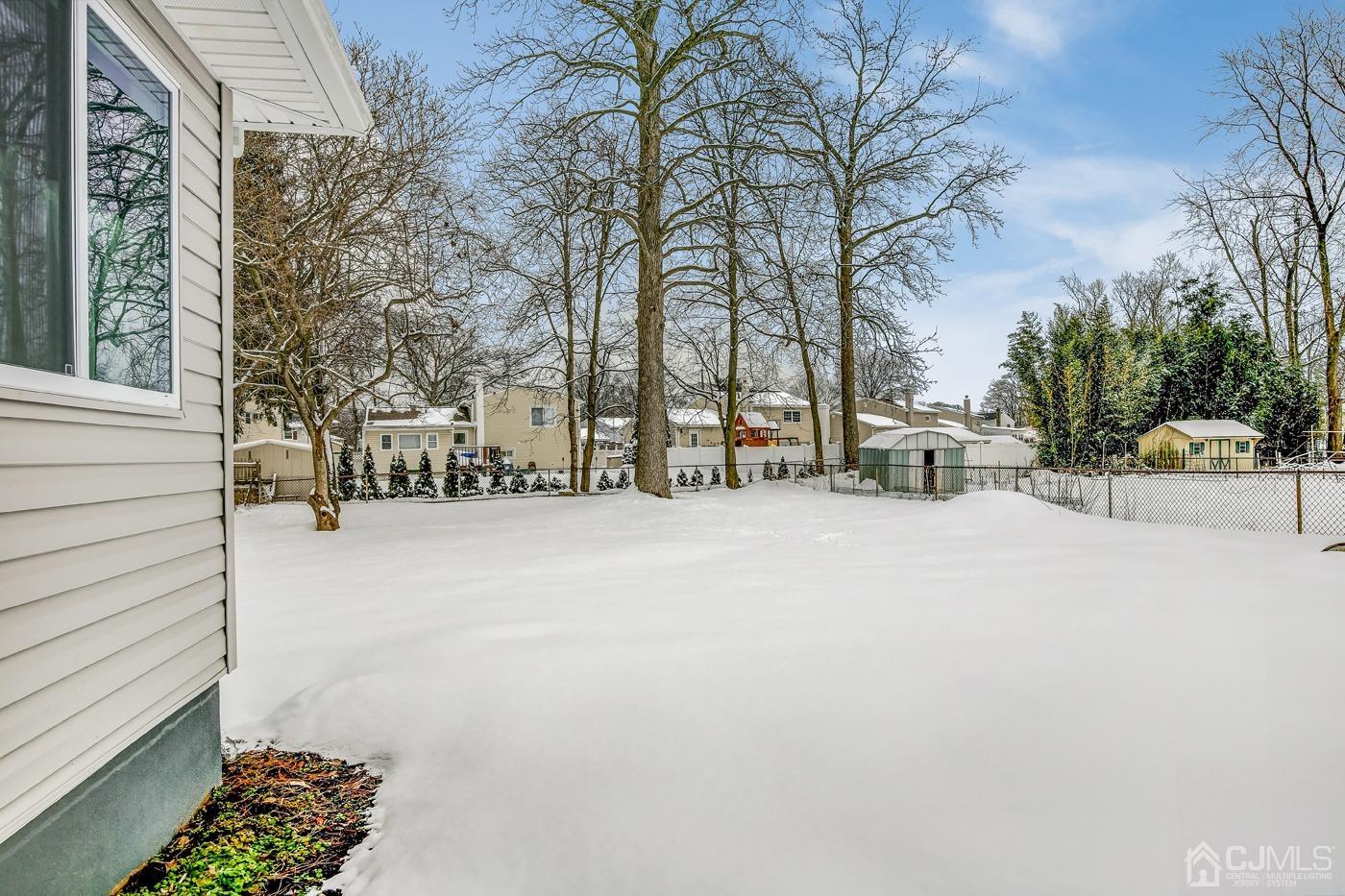 59 Stony Road Edison, NJ 08817 - Photo 25 of 27 a view of outdoor space with trees