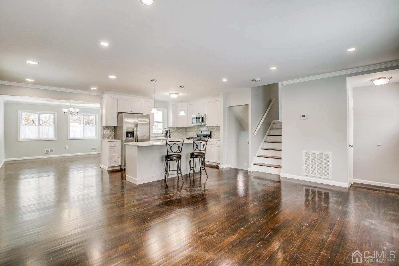 59 Stony Road Edison, NJ 08817 - Photo 5 of 27 a view of kitchen with cabinets and wooden floor