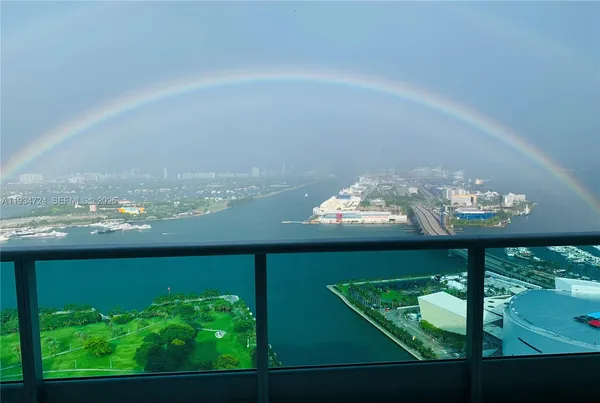 a view of a balcony with chair and table