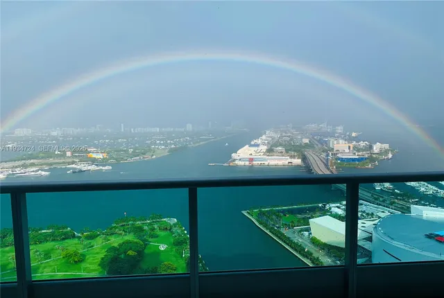 a view of a balcony with chair and table