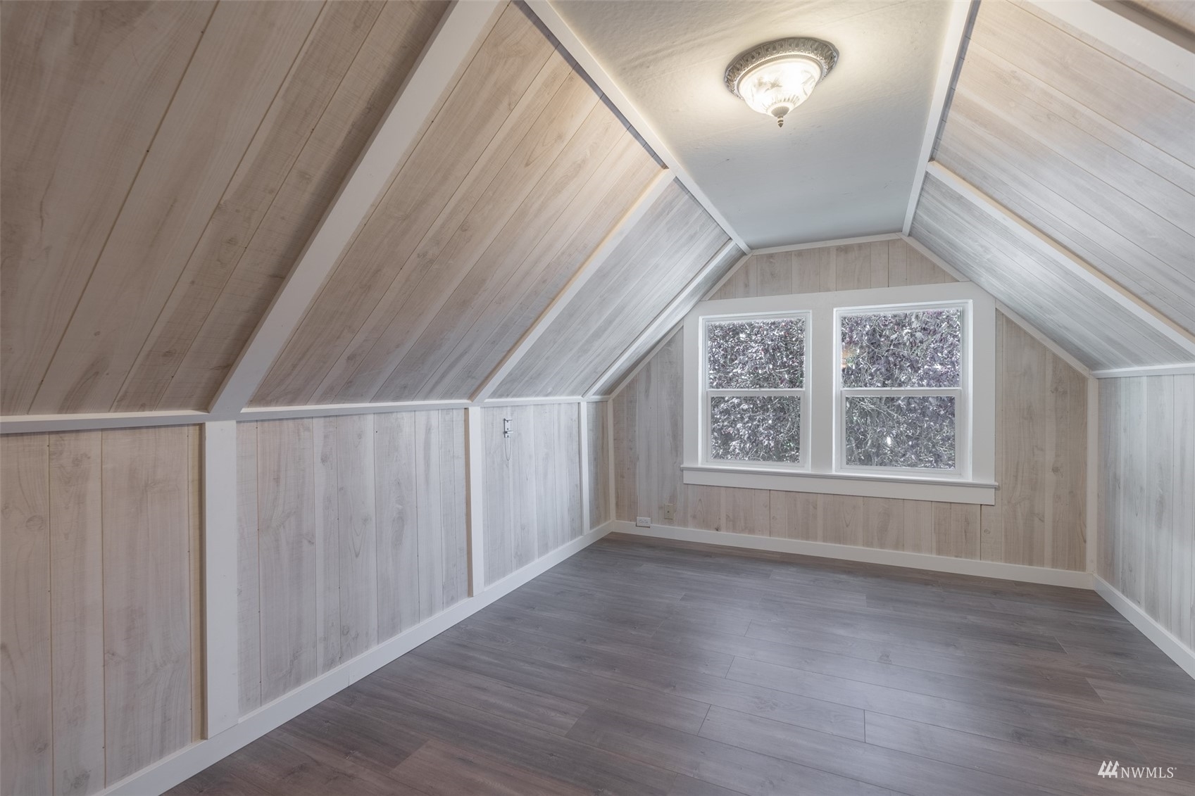 5415 Parker Road East Sumner, WA 98390 - Photo 15 of 27 an empty room with wooden floor and windows
