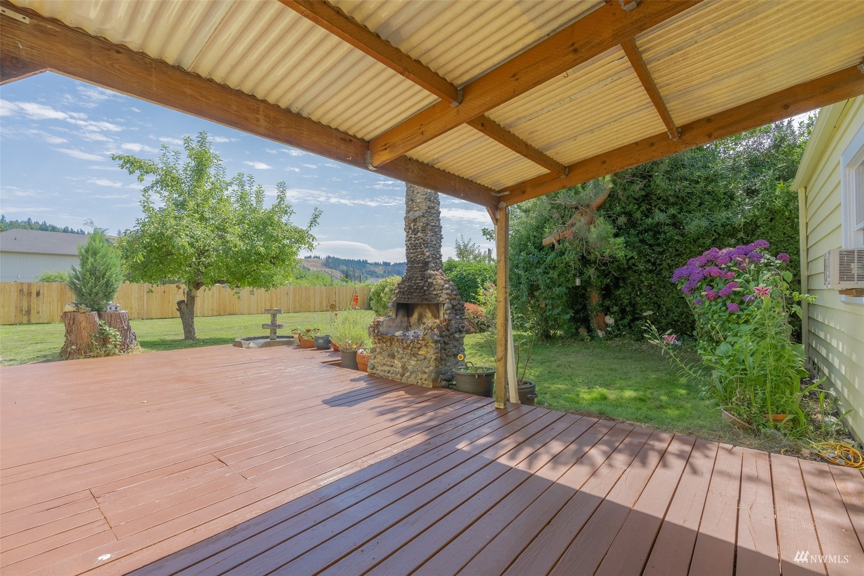 5415 Parker Road East Sumner, WA 98390 - Photo 19 of 27 a view of a backyard with garden
