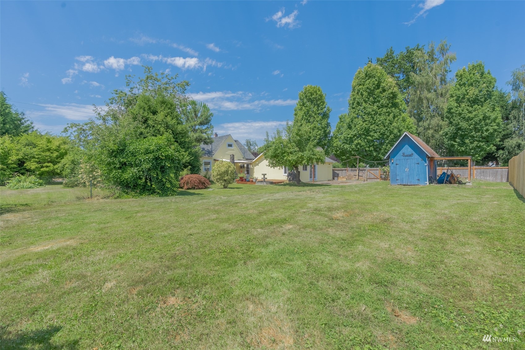 5415 Parker Road East Sumner, WA 98390 - Photo 21 of 27 a view of a house with a yard