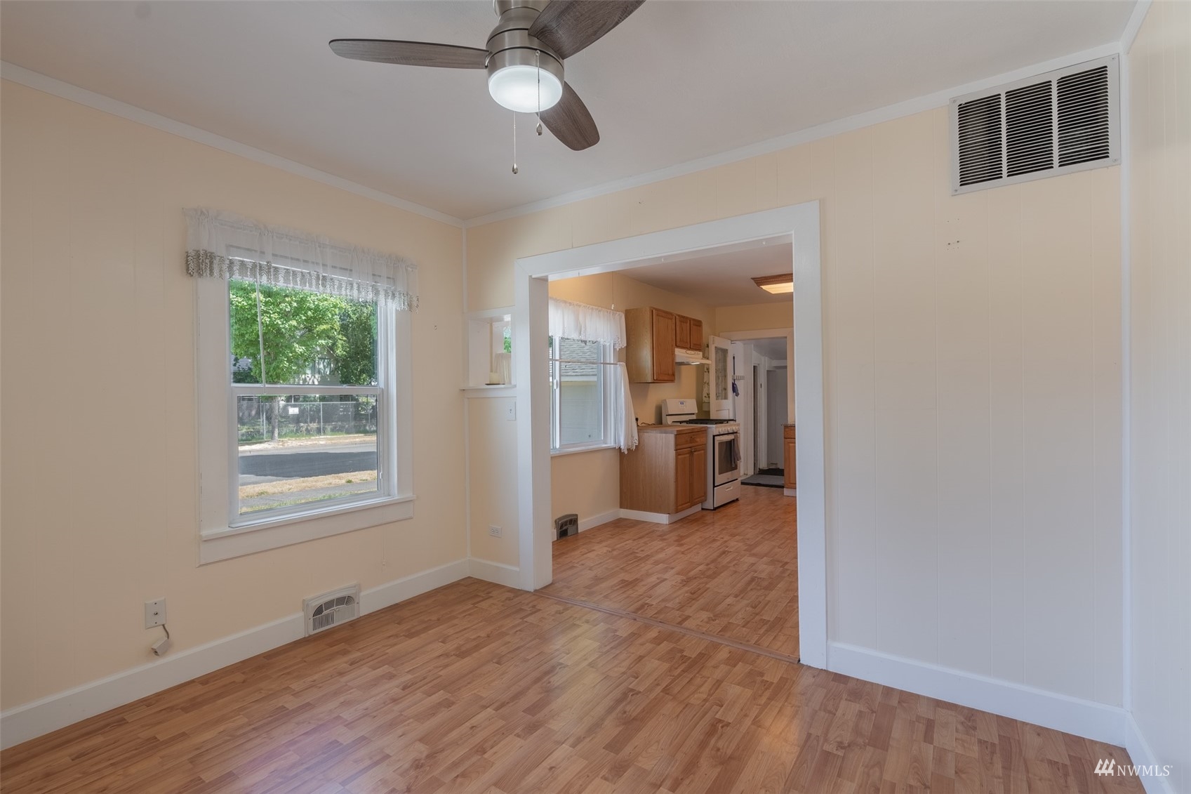 5415 Parker Road East Sumner, WA 98390 - Photo 4 of 27 wooden floor in an empty room with a window