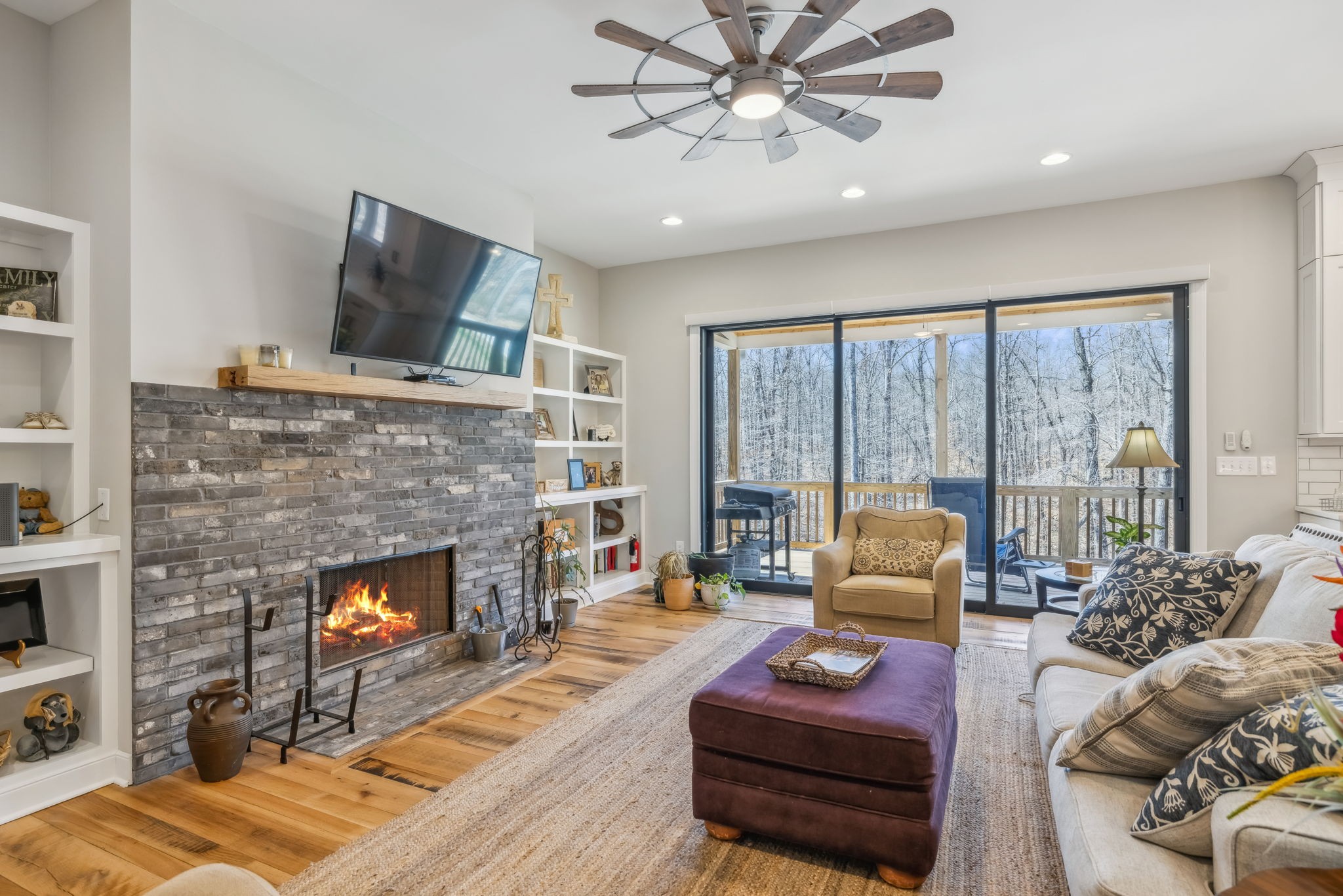 6033 Vesper Way Franklin, TN 37064 - Photo 15 of 83 a living room with furniture and a fireplace