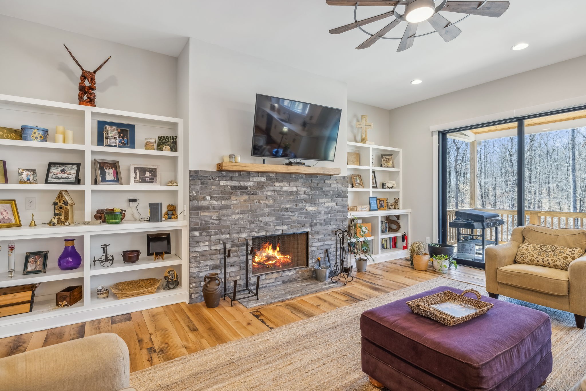 6033 Vesper Way Franklin, TN 37064 - Photo 16 of 83 a living room with furniture fireplace and flat screen tv