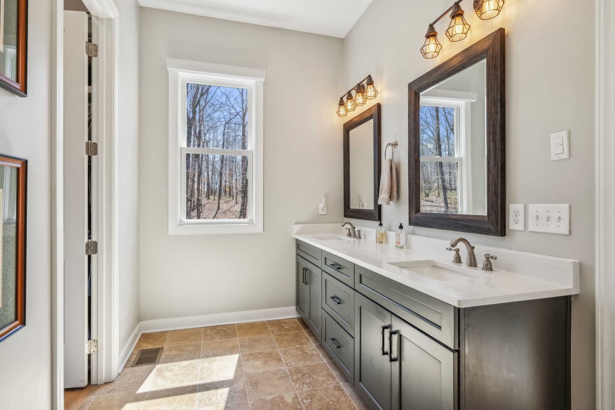6033 Vesper Way Franklin, TN 37064 - Photo 48 of 83 a bathroom with a double vanity sink and a mirror