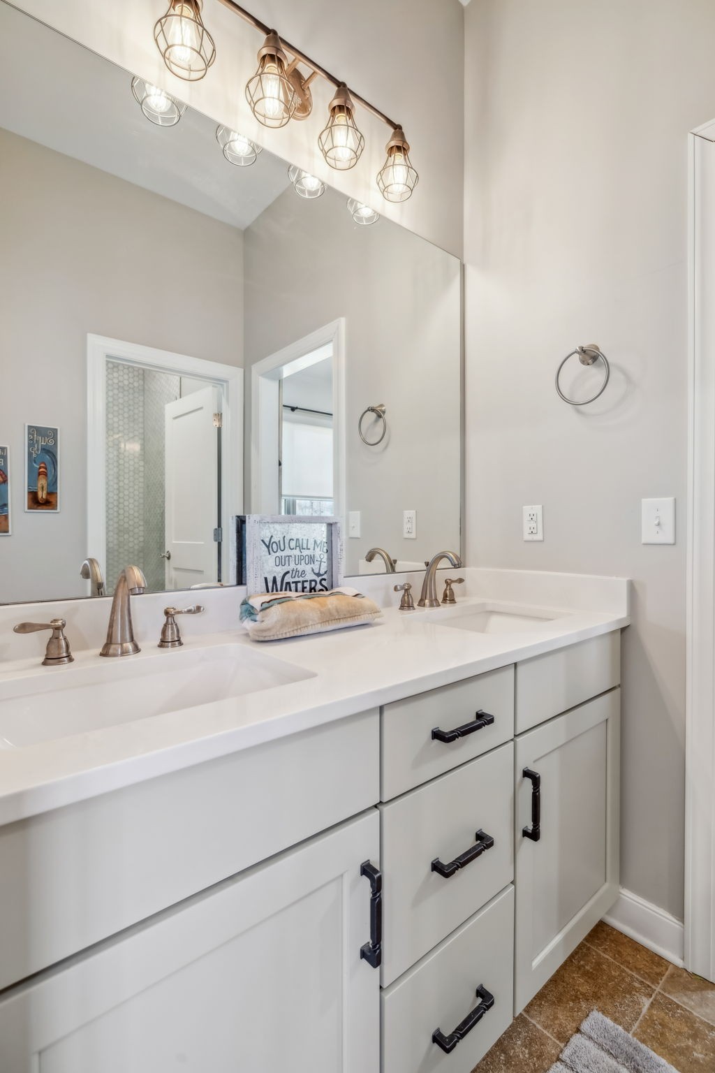 6033 Vesper Way Franklin, TN 37064 - Photo 59 of 83 a bathroom with a double vanity sink and a mirror