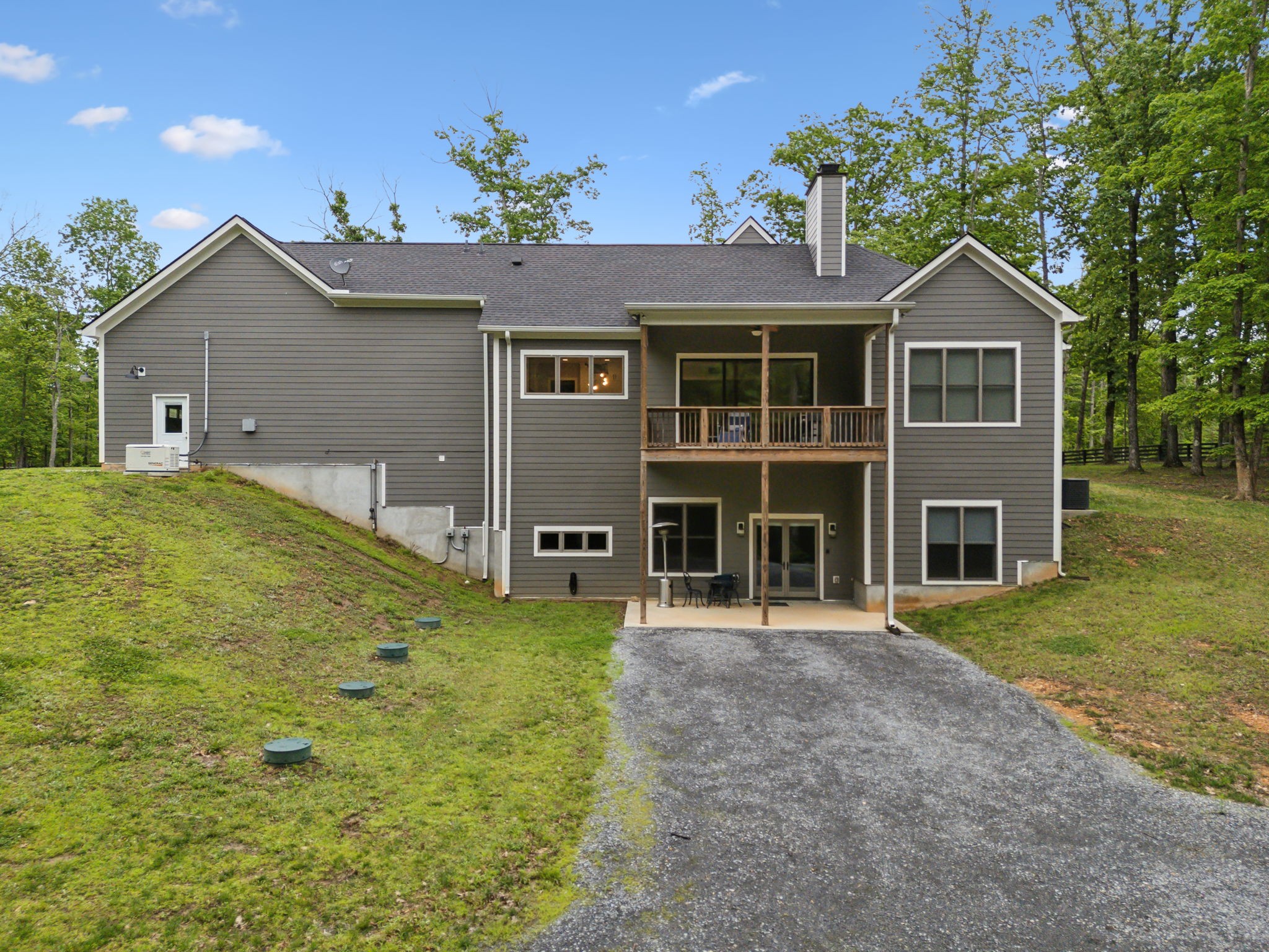 6033 Vesper Way Franklin, TN 37064 - Photo 72 of 83 a front view of a house with a yard and garage