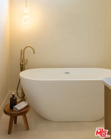 a view of a bathtub in a bathroom