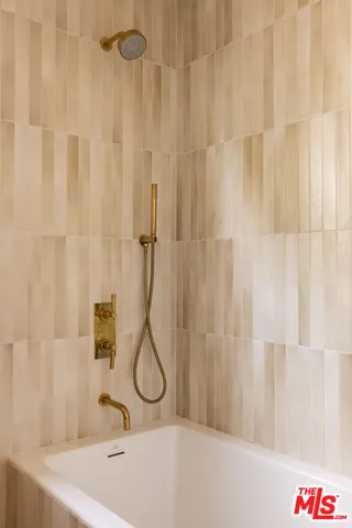 a bathroom with a sink and a shower