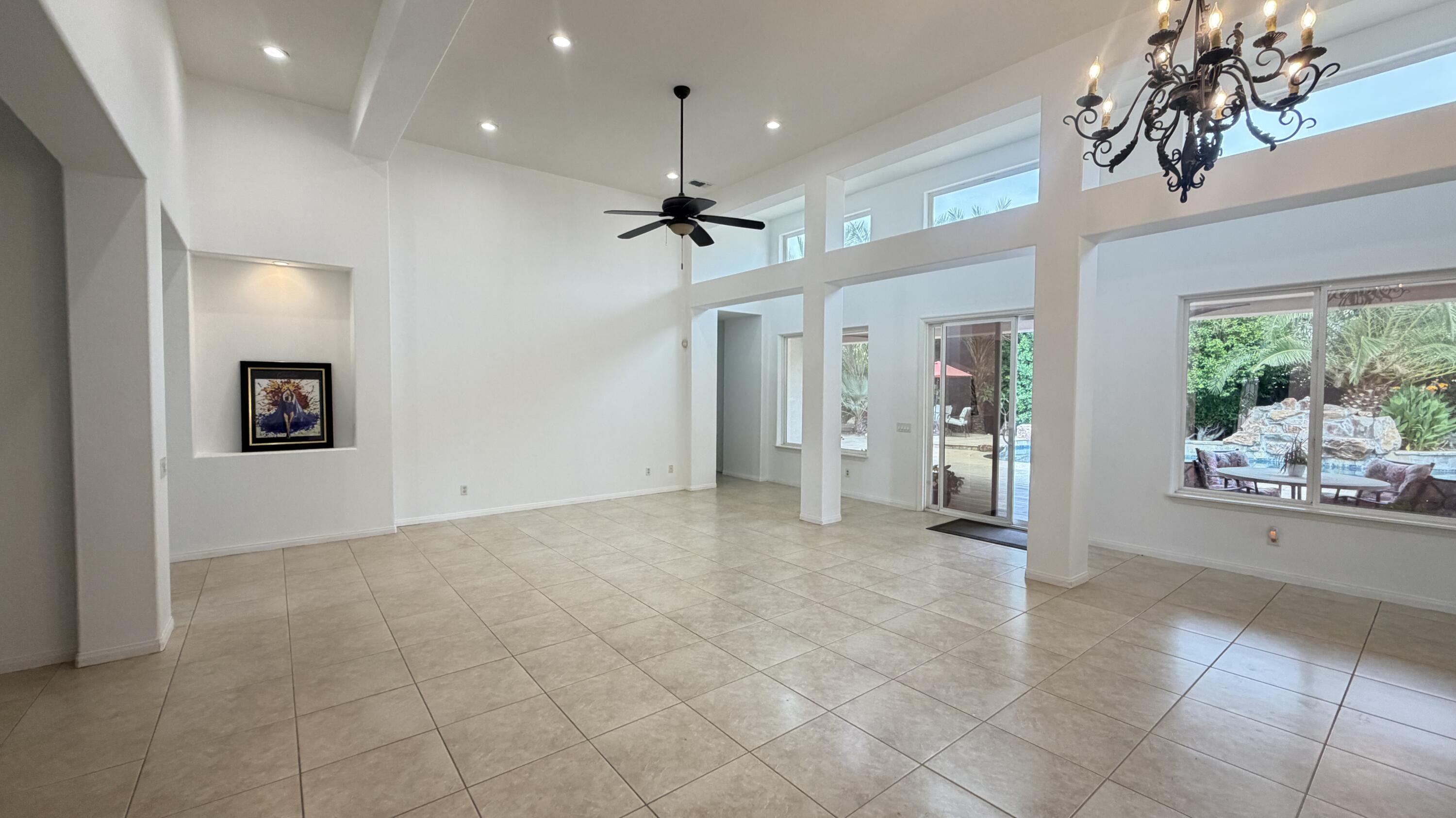 49578 Colorado Street Indio, CA 92201 - Photo 21 of 37 a view of an empty room with a window